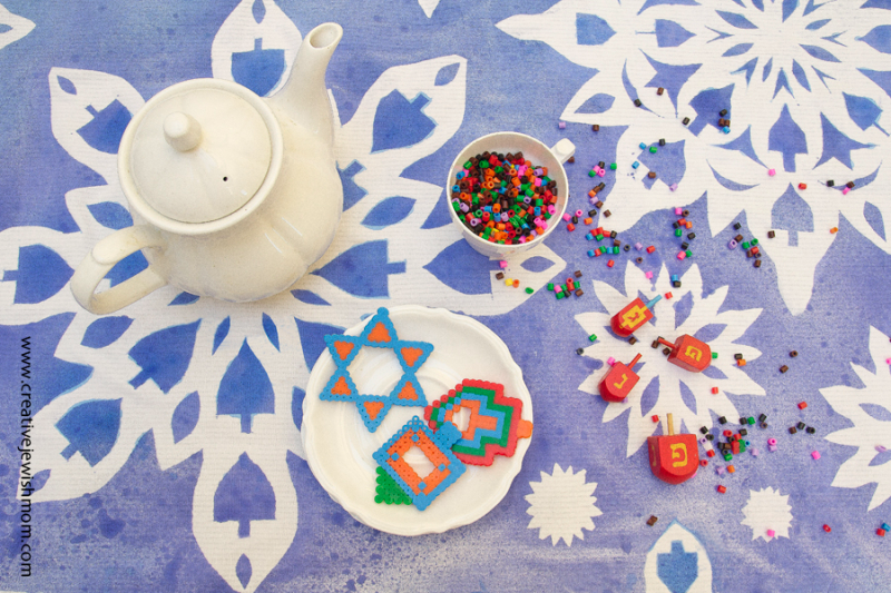 DIY Hanukkah Tablecloth: Giant Blue And White Stenciled Snowflakes