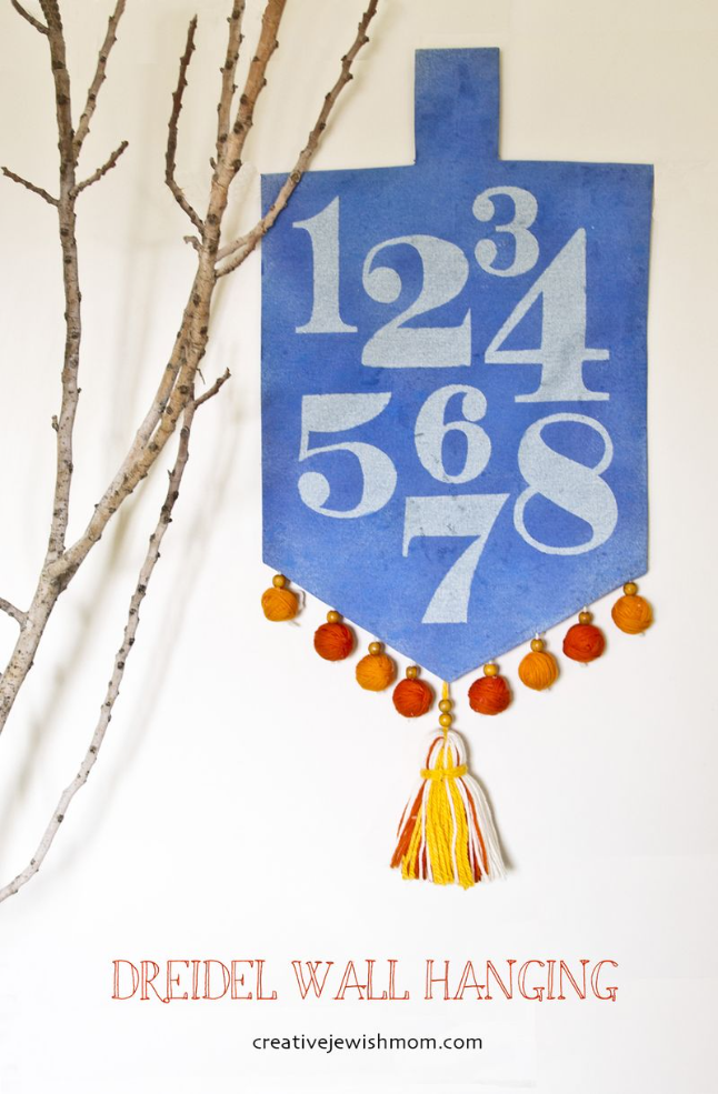 DIY Fabric Dreidel Wall Hanging With Stencilled Numbers