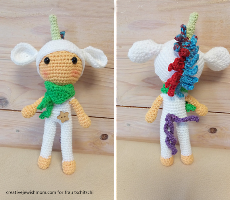 Crocheted-doll-with-unicorn-costume