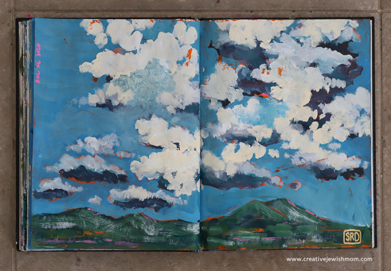 Painting Clouds On An Orange Background