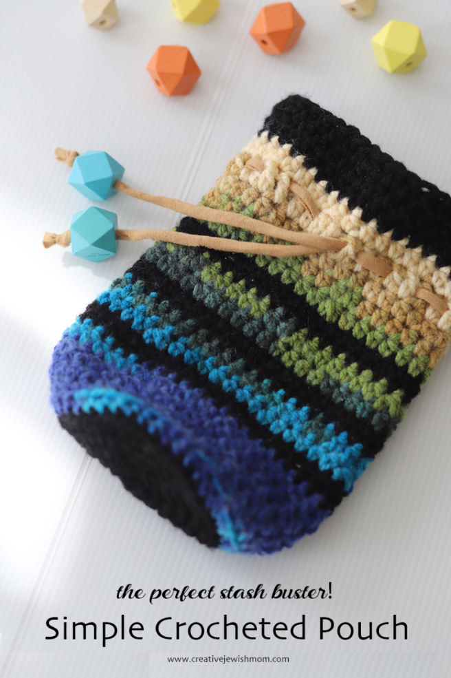 Simple Crocheted Pouch With Colorful Stripes And Drawstrings